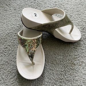 White and sparkly gold fit flops size 2